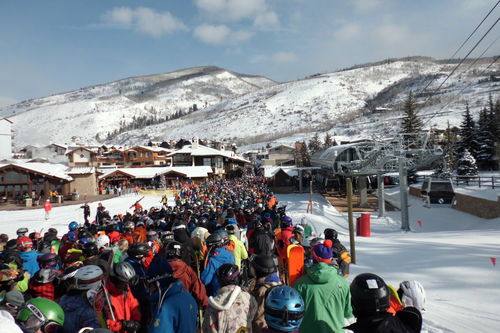 Skiers wait in a lift line at the base of Vail Mountain. Lift queues, food and beverage pricing and the cost of getting started in the sport all feature in the activist case that shareholders will now be asked to judge.