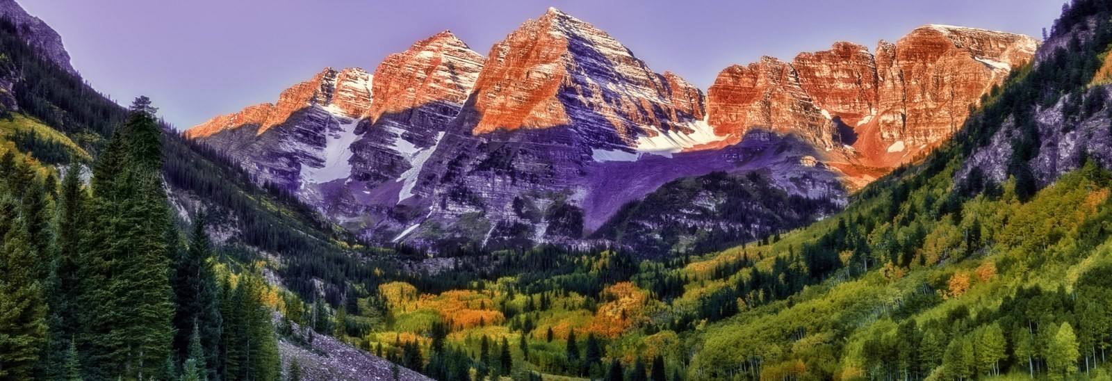 Alpenglow on the Maroon Bells in the White River National Forest.